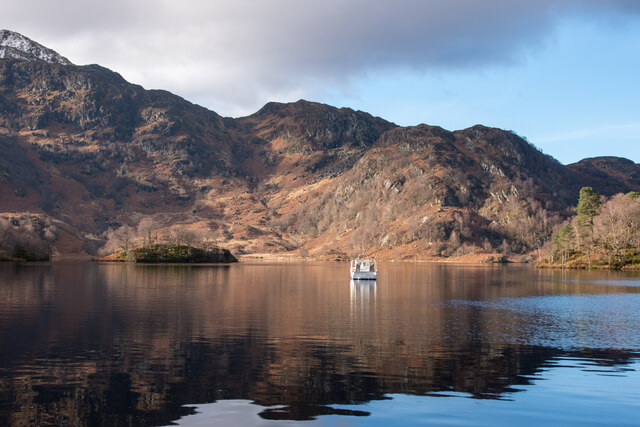 A boat on the water of Loch Katrine