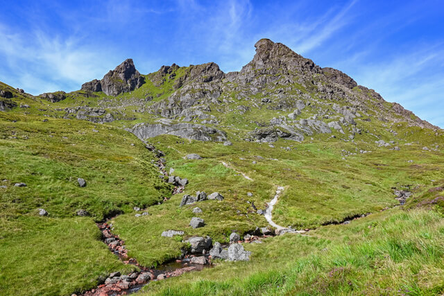 Grassy verge of The Cobbler mountain in Scotland
