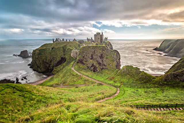 An external shot of Dunnottar Castle and the road leading to it