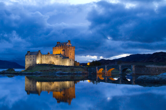 Eilean Donan Castle lit up at night time